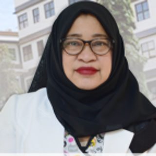 Monerah Luzviminda M. Macud, MD, FPCP, PM&T and Social Hygiene Facility Head, wearing a black hijab
