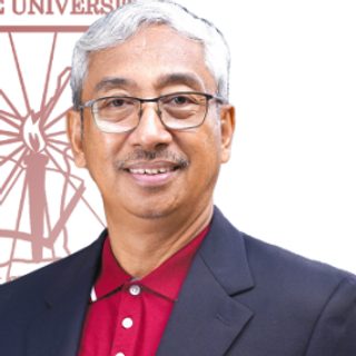 Dr. Arthur G. Ibañez, Ph.D., ASEAN Engr., Office of the University President, in a red shirt and blazer