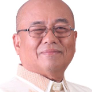 Hon. Dionisio C. Ledres Jr., Member, Regional Director, in a barong