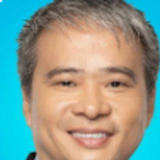 Hon. Emmanuel Joel Jose Villanueva, Member, in a dark suit jacket