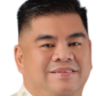 Hon. Jude A. Acidre, Member, in a barong
