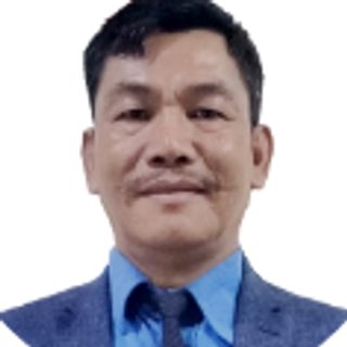 Hon. Ricardo B. Casauay, Member Faculty Representative, in a suit and tie