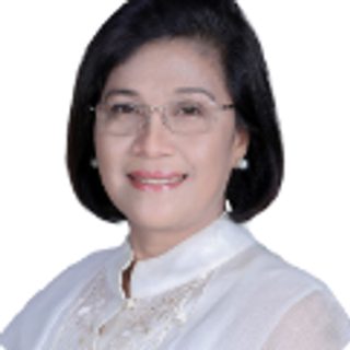Hon. Shirley C. Agrupis, Chairperson CSU BOR and Commission on Higher Education, in a white blouse