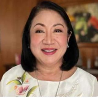 Atty. Marilyn B. Yap, Civil Service Commission Vice-Chairperson, DAP BOT, in a white blouse