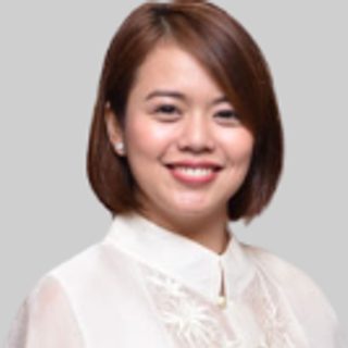 Hon. Alexandra C. Casubuan-Tan, Board Member, in a white barong