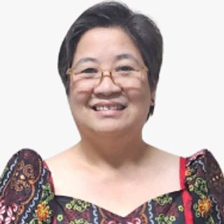 Ms. Anna Marie DC Reyes, Provincial Human Resource Management Officer, in a patterned blouse