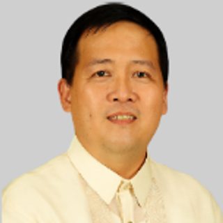 Hon. Anthony L. Yap, Board Member, in a barong