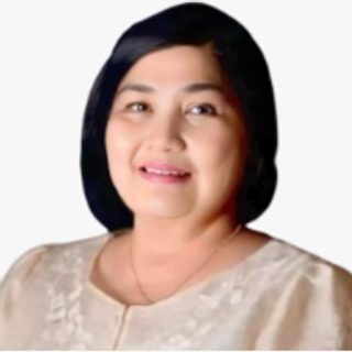 Ms. Christine M. Pine, Provincial Agriculturist, in a light-colored blouse