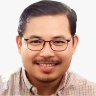 Atty. Earl Ligorio R. Turano II, Provincial Administrator, in a checkered shirt