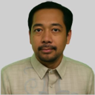 Hon. Emmanuel Buenaventura, Board Member, in a light barong