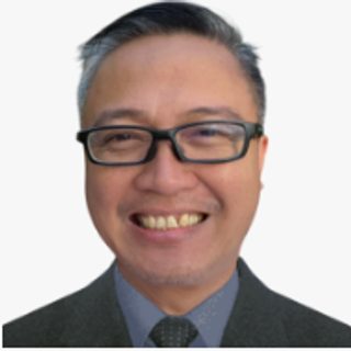 Enp. Jose Maria S. Dalupan, OIC - Provincial Planning and Development Officer, in a suit and tie