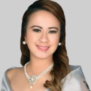 Hon. Farrah Fay C. Ilano-Navarro, Board Member, wearing a necklace