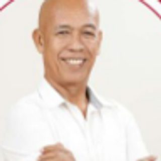 Hon. Emeterio E. Blase, City Councilor, in a white shirt