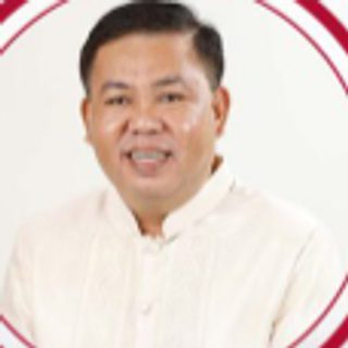Hon. Omar P. Ranain, City Councilor, in a white barong