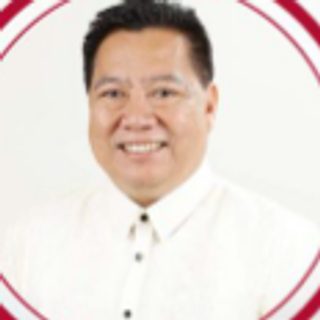 Hon. Engr. Ronald L. Ang, City Councilor, in a white barong