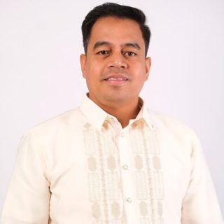 Hon. Alexander C. Bernardo, Municipal Councilor, in a barong