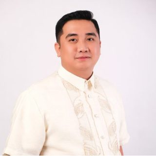 Hon. Christian V. Coronel, Municipal Councilor, in a barong