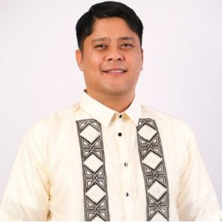 Hon. Marvin D. Bautista, Municipal Councilor, in a barong