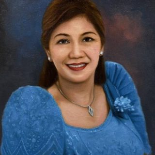 Maryanne P. Marcos, 2016-2025, in a blue dress